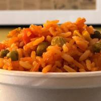 Spanish Rice · Seasoned rice with onions, fresh vegetables and our special spices.