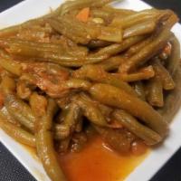 Fasolakia · Greek style green beans served with our special sauce.