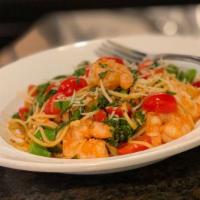 Tuscan Shrimp Pasta · Shrimp, spaghetti, broccolini, basil, tomato, olive oil, crushed red pepper.