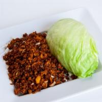 Lettuce Wraps · All-natural chicken, water chestnuts, scallions, rice sticks, garlic soy