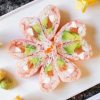 Pink Lady Roll · Salmon, avocado, crab meat, cooked shrimp cream cheese with soy paper.