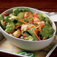Side Salad · Fresh romaine, housemade croutons, cucumbers, carrots & tomatoes served with dressing of cho...