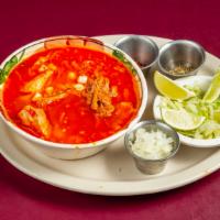 Pozole · Delicious hearty pork stew and hominy. Deep red broth made with guajilo chiles and aromatic ...