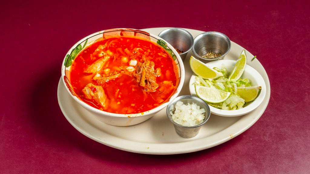 Pozole · Delicious hearty pork stew and hominy. Deep red broth made with guajilo chiles and aromatic onions, garlic and fresh oregano.