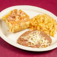 Mexican Special (Mild) · Chile verde chunks of pork in a mild gravy, served in a deep fried tortilla bowl with beans,...