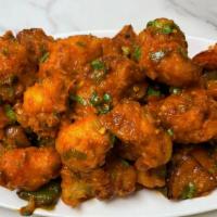 Gobi Bytes · Cauliflower fritters fried in spicy batter and then sautéed with our special 65 sauce.