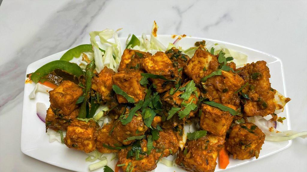 Zesty Cottage Cheese Bytes · Indian cottage cheese marinated with spices and then sautéed in our special 69 sauce.