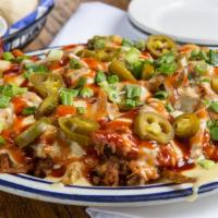 Smokehouse Fries · New. Fresh-cut fries smothered with pulled pork, queso, BBQ sauce, jalapeños and topped with...