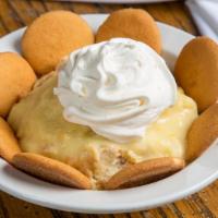 Banana Pudding · Made from scratch pudding with vanilla wafers and finished off with a creamy whipped topping.