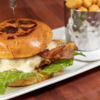 Cajun Chicken · Grilled chicken breast with cajun seasonings.  Pickles, lettuce, tomato, red onion & our sig...