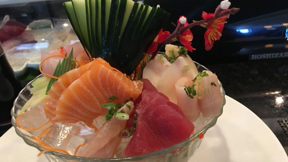Sashimi Entree · 13pcs of assorted raw fish.