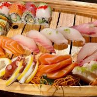 Love Boat · 10pcs sushi, 18pcs sashimi with a rainbow, dragon roll.