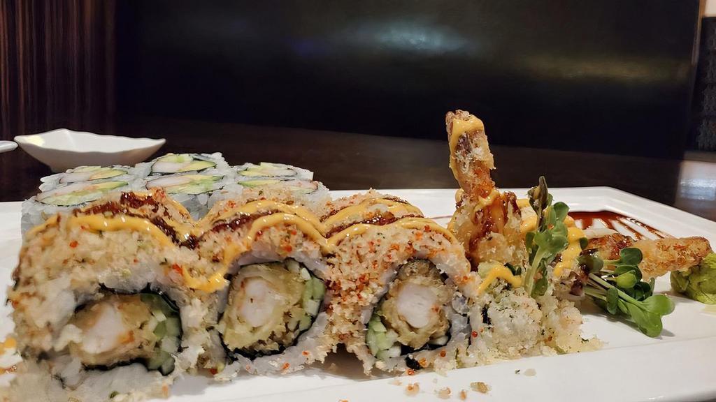 Crunch Roll · Inside shrimp tempura, cucumber, kaiware inside, topped with crunch masago and nori fumi.