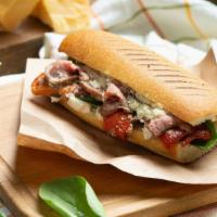 Combo Sandwich · Thinly shaved Italian roast beef and sweet Italian sausage with your choice of peppers, topp...