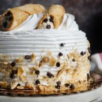 Cannoli Cake · Delicious cream cheesecake with a graham cracker base.