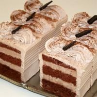 Chocolate Mousse · Layers of chocolate chiffon cake filled and covered with chocolate mousse.