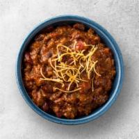 Vegetable Chili · Satsifying chili full of vegetables and topped with shredded cheese.