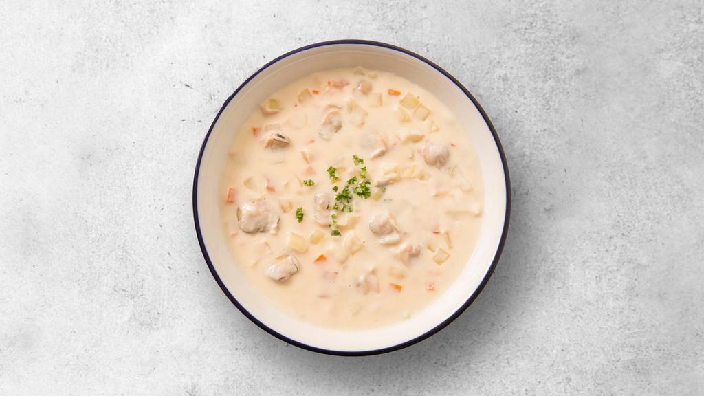 New England Clam Chowder · Creamy soup with clams.