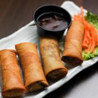Fried Egg Rolls · Served with sweet chili sauce.