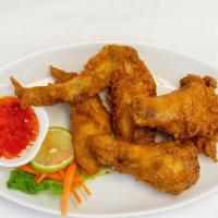 Fried Chicken Wings · Deep-fried chicken wings, served with sweet chili sauce.