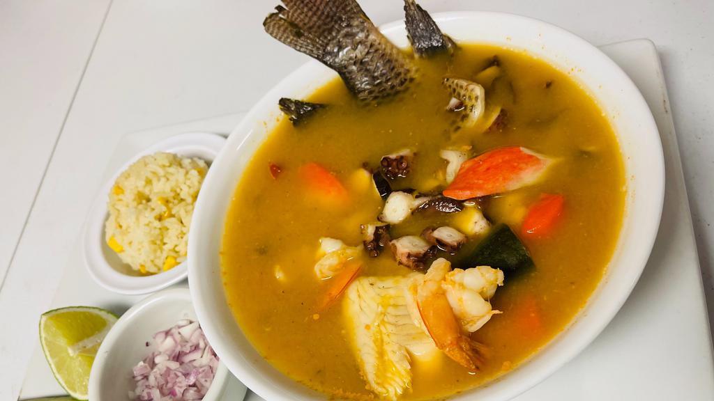 Levanta Muertos / House Seafood Soup · Camarón, Filete, Mojarra, Jaiba, Pulpo, Callo de Hacha. / Shrimp, Tilapia Fillet, Whole Tilapia, Crab, Octopus, Scallops.