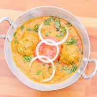 Malai Kofta · Vegetarian. Crispy paneer balls spiced and fried then cooked in a creamy Indian masala sauce.