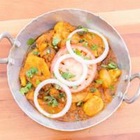 Aloo Tarkari · Vegan. Fresh potatoes flash fried in a wok with sliced tomato, cilantro, green chili and oni...