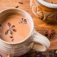 Hot Tea (Chai) · Fresh brewed desi milk chai.