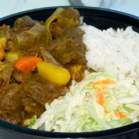 Curry Goat Bowl · Curry Goat cooked in an authentic Jamaican Curry Sauce. Seasoned with Blended Herbs and Spic...
