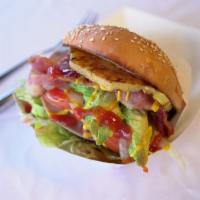 Del Gordo Hawaiiana · Grilled pineapple, lettuce, onions, tomatoes, avocado, pickled peppers, mayo, and mustard.