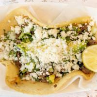 Tacos Norteños · Any type of meat, onions, cilantro, avocado, and queso fresco.