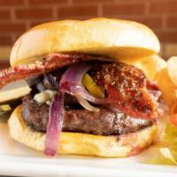 Iu Blue Cheese Burger · Caramelized onions, burgundy mushrooms, jalapenos, bleu cheese crumbles and honey pepper bac...