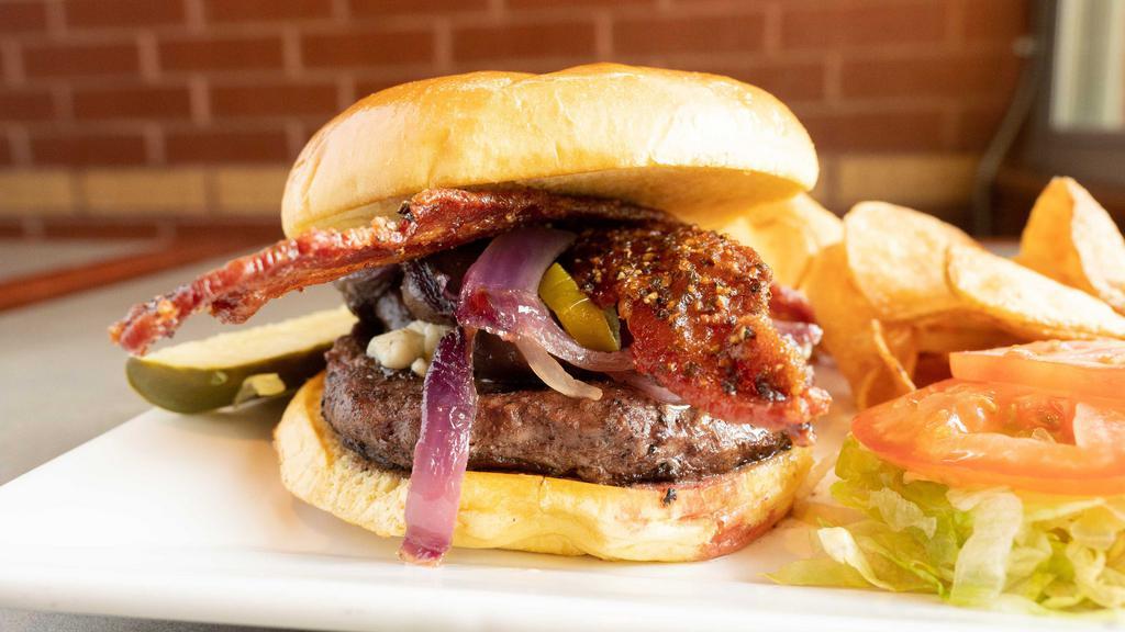 Iu Blue Cheese Burger · Caramelized onions, burgundy mushrooms, jalapenos, bleu cheese crumbles and honey pepper bacon top this tasty burger.