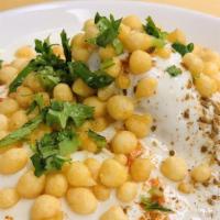 Dahi Vada (2 Pieces) · Gluten-free. Lentil vada soaked in yogurt and served with savory toppings.