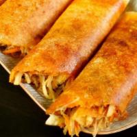 Spring Dosa · Vegan. Crunchy spring veggies and noodles wrapped in dosa crepe. Served with sambar, coconut...