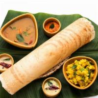 Chettinad Vegetable Dosa · Gluten-free. Dosa stuffed with vegetable sauteed in chettinad gravy. Served with sambar, coc...