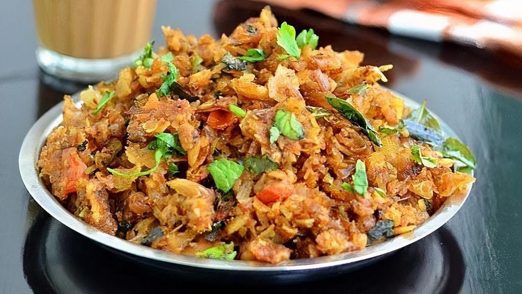 Kothu Parota · Scrambled parota bread with onion, veggies & roasted spices countryside favorite.