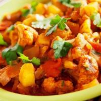 Aloo Gobi Masala · Gluten-free. Potatoes & cauliflower simmered in cumin, ginger & tomato sauce.