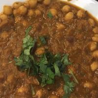 Chickpea Masala · Vegan & gluten-free. Spiced chickpeas in ginger infused onion & tomato sauce.