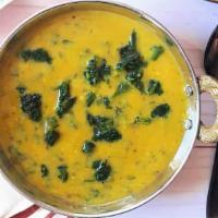 Dal Palak · Gluten-free. Slow cooked moong dal with spinach & spices.