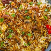 Mushroom Biryani · Gluten-free. Basmati rice infused with aromatic spices, veggies, mushroom & herbs. Served wi...