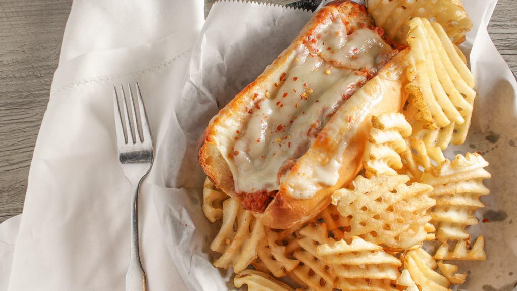 Italian Grinder · Graziano Italian sausage slow-cooked, with are made from scratch marinara sauce and topped with mozzarella cheese.