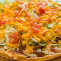 Taco Pizza · Seasoned ground beef, chips, lettuce, cheddar cheese, and tomatoes.