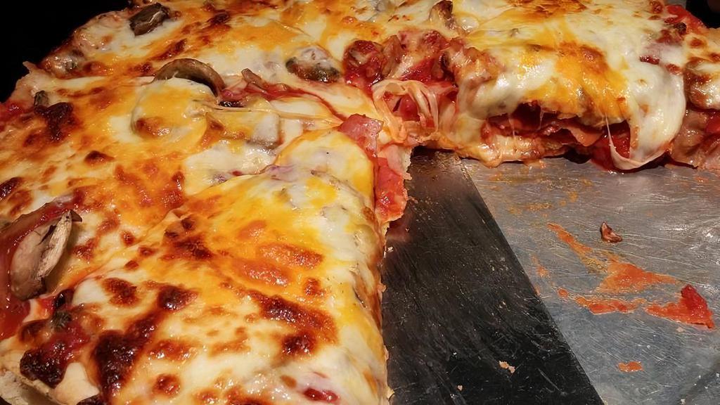The Meat Pie Pizza · Graziano Italian sausage, pepperoni, ham, and bacon.