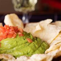 Guacamole Dip · Fresh avocados with a blend of our secret spices, served with fresh corn or flour tortilla c...