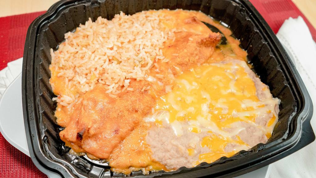 One Enchilada Plate · One enchilada (beef or chicken) with a side of beans and rice.