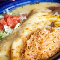 Seafood Enchilada · One enchilada with shrimp and surimi crab meat served with a side of beans and rice.
