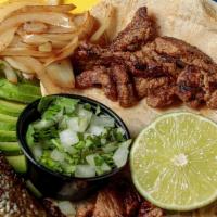  Steak Tacos · Three soft corn tortillas filled with our marinated steak, garnished with grilled onions, fr...