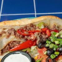 Philly Steak Sandwich · Choice of thinly sliced steak or fajita chicken, grilled with sweet onions, green, and red p...