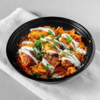 Shish Tawook Bowl · Basmati rice topped with shish tawook which is A boneless breast of chicken, marinated in ou...